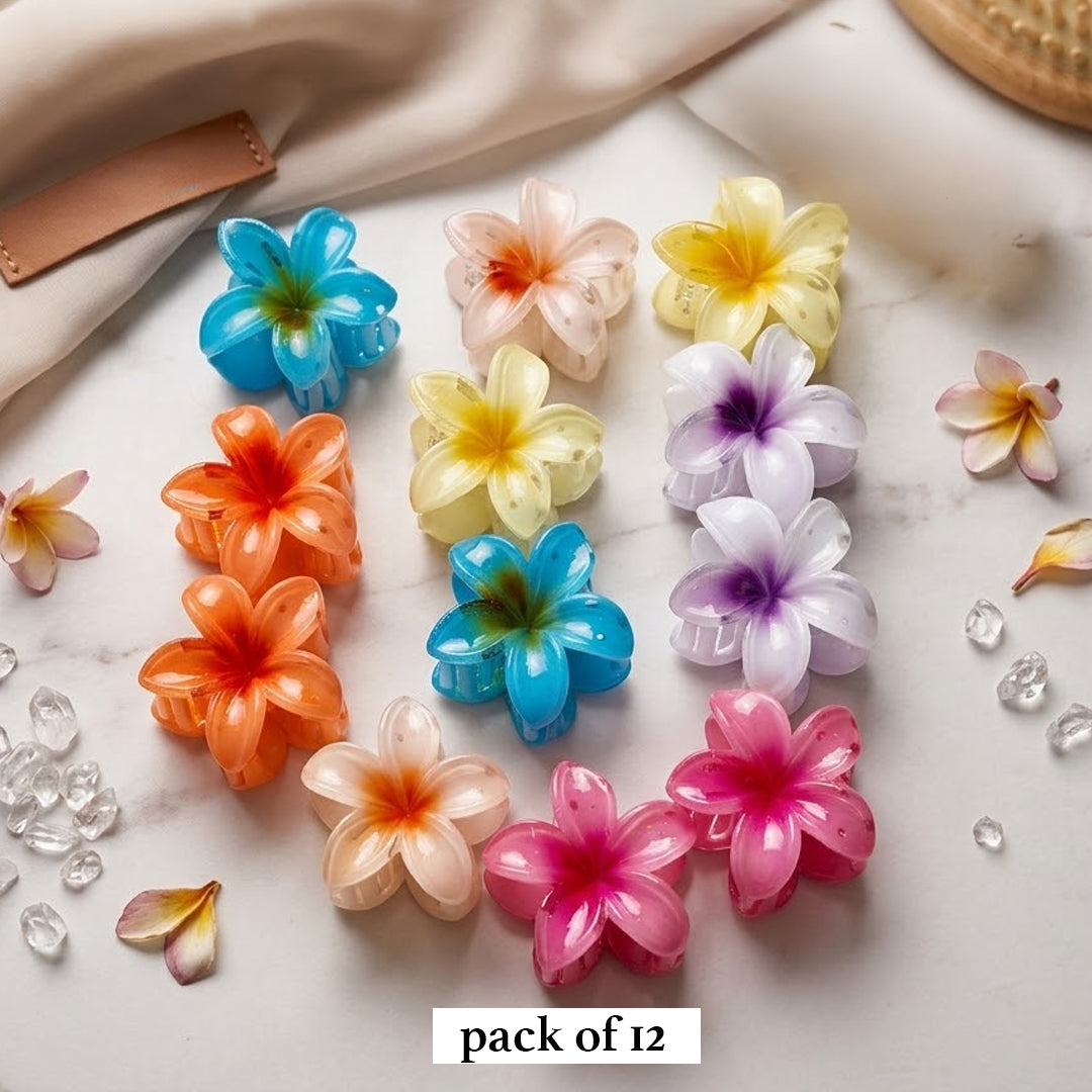 Elevate your everyday hairstyle with a touch of island paradise. This vibrant collection of plumeria-shaped hair claws brings the effortless beauty of the tropics directly to your vanity.